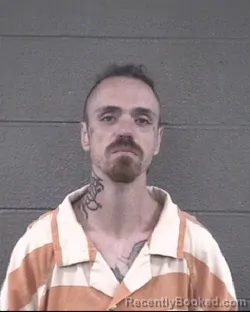 Mugshot of Corey Lee Barnes booked in Buncombe County, North Carolina on August 27, 2026