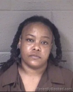 Mugshot of CHRISTINA MEANS booked in Buncombe County, North Carolina on March 30, 2026