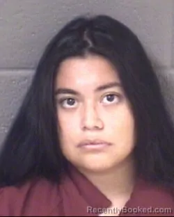 Mugshot of CLAIRE ELIZABETH MEJIA MARTIN booked in Buncombe County, North Carolina on July 10, 2026