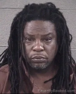 Mugshot of CHRISTOPHER EDWARD MOORE booked in Buncombe County, North Carolina on March 24, 2026