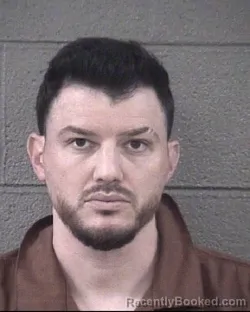 Mugshot of Cameron Ross Melton booked in Buncombe County, North Carolina on August 16, 2026