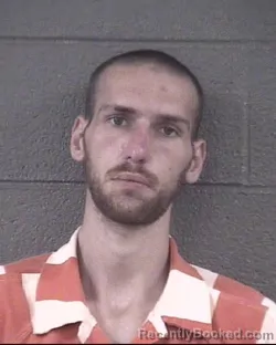 Mugshot of CHRISTOPHER DEKOTA SMITH booked in Buncombe County, North Carolina on July 25, 2026