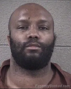 Mugshot of DEREK KWINTAVIUS BELL booked in Buncombe County, North Carolina on March 20, 2026