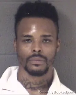 Mugshot of DEVON LEWIS RAYSHAWN WHITMIRE