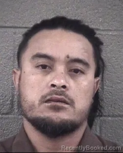 Mugshot of ESIROM MOURISIO booked in Buncombe County, North Carolina on March 25, 2026