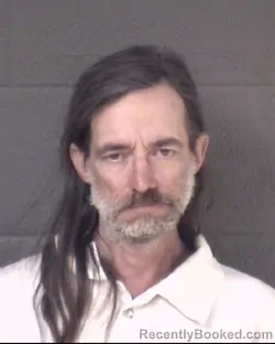 Mugshot of IAN SCOTT BANKS booked in Buncombe County, North Carolina on March 23, 2026