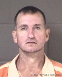Mugshot of Jonathan Thomas Cooper booked in Buncombe County, North Carolina on September 9, 2026