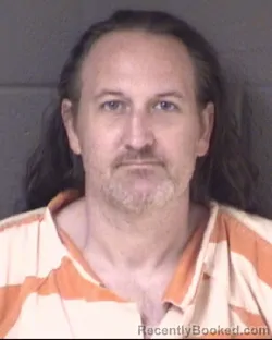 Mugshot of JONATHAN ARNOLD EVANS booked in Buncombe County, North Carolina on July 21, 2026