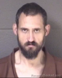 Mugshot of JUSTIN EARL FOWLER booked in Buncombe County, North Carolina on July 9, 2026