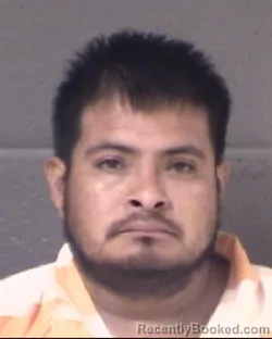 Mugshot of JOSE DANIEL GARCIA-OLGUIN booked in Buncombe County, North Carolina on July 8, 2026