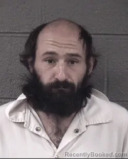 Mugshot of JARED GERALD METCALF booked in Buncombe County, North Carolina on March 29, 2026