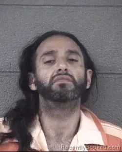 Mugshot of JOSHUA LEE MARTINEZ FAULK booked in Buncombe County, North Carolina on July 3, 2026