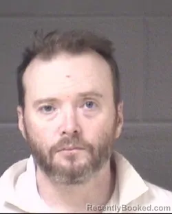 Mugshot of JUSTIN MICHAEL MOORE booked in Buncombe County, North Carolina on March 18, 2026