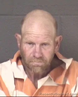 Mugshot of Jacob Robert Mickel booked in Buncombe County, North Carolina on August 24, 2026