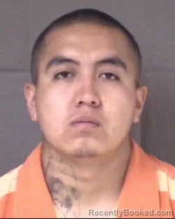 Mugshot of JUAN MANUEL RIVAS FLORES booked in Buncombe County, North Carolina on July 22, 2026