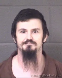 Mugshot of JACOB WARREN RIDDLE booked in Buncombe County, North Carolina on July 6, 2026