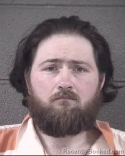 Mugshot of JACOB BENJAMIN SHELTON booked in Buncombe County, North Carolina on August 4, 2026