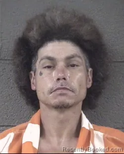 Mugshot of JUSTIN DWAYNE SHELTON booked in Buncombe County, North Carolina on May 27, 2026