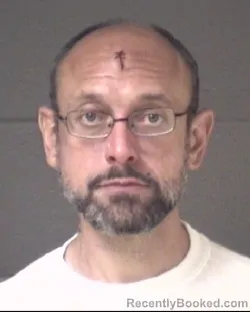 Mugshot of JONATHAN ANDREW THOMAS booked in Buncombe County, North Carolina on March 21, 2026