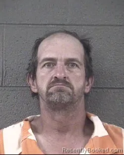 Mugshot of KENNY DWAYNE AUSTIN booked in Buncombe County, North Carolina on July 7, 2026