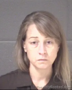 Mugshot of KIMBERLY LOUISE DAL SANTO booked in Buncombe County, North Carolina on April 4, 2026