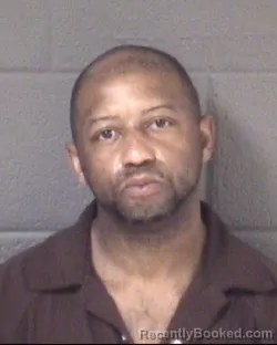 Mugshot of Kumasi Lorenzo Franklin booked in Buncombe County, North Carolina on August 24, 2026