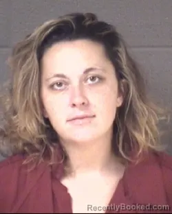 Mugshot of KAYLA LYNN HEHNER booked in Buncombe County, North Carolina on May 21, 2026