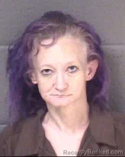 Mugshot of KRISTEN FERGUSON YARBER booked in Buncombe County, North Carolina on March 31, 2026