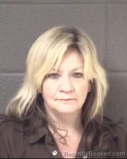 Mugshot of LISA JOHNSON MOORE booked in Buncombe County, North Carolina on March 17, 2026