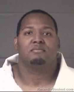 Mugshot of MICHAEL ADARIUS CORNETT booked in Buncombe County, North Carolina on March 14, 2026