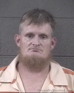 Mugshot of Micah William Cogdill booked in Buncombe County, North Carolina on August 26, 2026