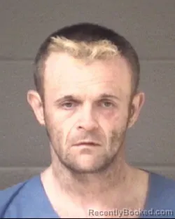 Mugshot of MITCHELL MONROE GUNTER booked in Buncombe County, North Carolina on March 24, 2026