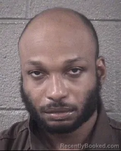Mugshot of MALIIK DEVON JACKSON booked in Buncombe County, North Carolina on May 9, 2026
