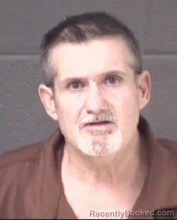 Mugshot of MICHAEL SCOTT OWENBY booked in Buncombe County, North Carolina on May 12, 2026