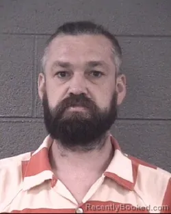 Mugshot of MIKHAIL MIKHAYLOVICH SIMONOVICH booked in Buncombe County, North Carolina on May 30, 2026