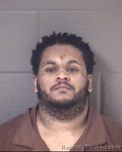 Mugshot of MALIK RAHIEM DASHAUN YOUNG booked in Buncombe County, North Carolina on March 31, 2026