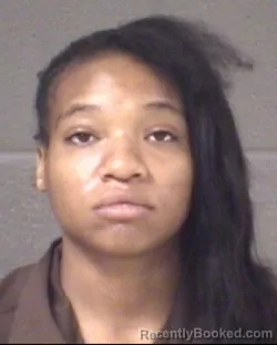 Mugshot of NOELANI GENITTA WINGO booked in Buncombe County, North Carolina on March 25, 2026