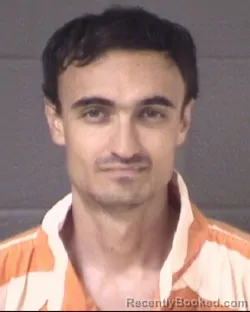 Mugshot of RUSLAN KISELEV booked in Buncombe County, North Carolina on July 22, 2026