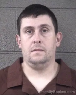 Mugshot of ROBERT EDWARD KUENZE booked in Buncombe County, North Carolina on March 30, 2026