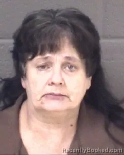 Mugshot of REBECCA DENISE SHELTON booked in Buncombe County, North Carolina on March 19, 2026