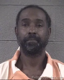 Mugshot of Travis Montgomery Brown booked in Buncombe County, North Carolina on August 27, 2026