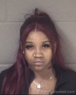 Mugshot of TIARA SHUNTAE DAVIS booked in Buncombe County, North Carolina on March 23, 2026