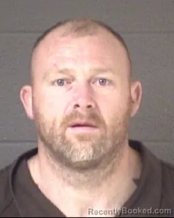 Mugshot of TRAVIS WARREN GLENN booked in Buncombe County, North Carolina on March 24, 2026