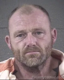 Mugshot of TRAVIS WARREN GLENN booked in Buncombe County, North Carolina on July 13, 2026