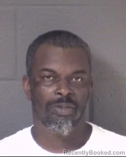 Mugshot of TRAVIS KEIL HARVIN booked in Buncombe County, North Carolina on April 1, 2026