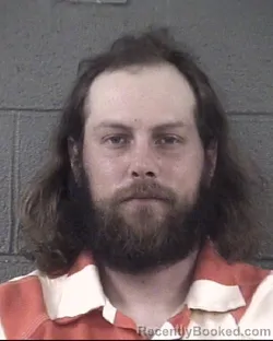 Mugshot of TYLER WILLIAM IRVINE booked in Buncombe County, North Carolina on March 31, 2026