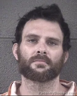Mugshot of TRAVIS LEVI MATHIS booked in Buncombe County, North Carolina on July 9, 2026