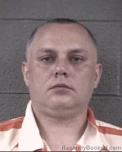 Mugshot of VOLODYMYR DENYSIUK booked in Buncombe County, North Carolina on April 6, 2026
