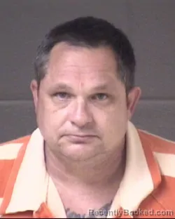 Mugshot of Wayne Kenneth Wells booked in Buncombe County, North Carolina on August 18, 2026