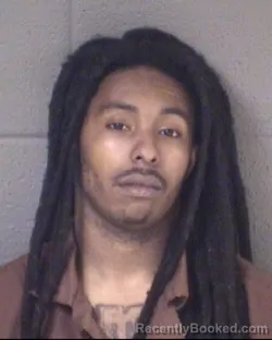 Mugshot of ZAVION KASEIS EVANS booked in Buncombe County, North Carolina on March 30, 2026
